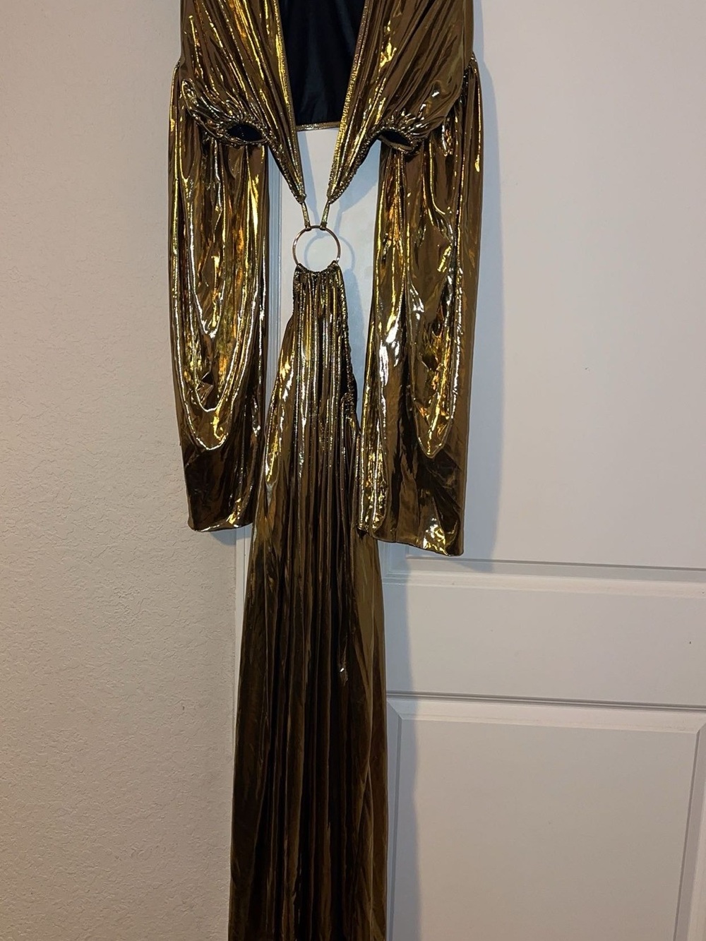 Metallic Gold Draped Wall Accent with Ring Detail